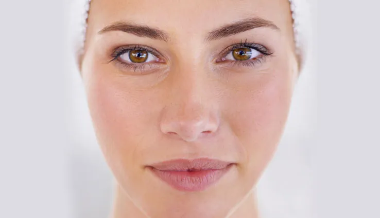 Close up image of a woman's face showing the fair skin tone colors.